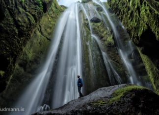 Battle of the camera lens cleaning cloths in Gljúfrabúi waterfall Gljúfrabúi waterfall